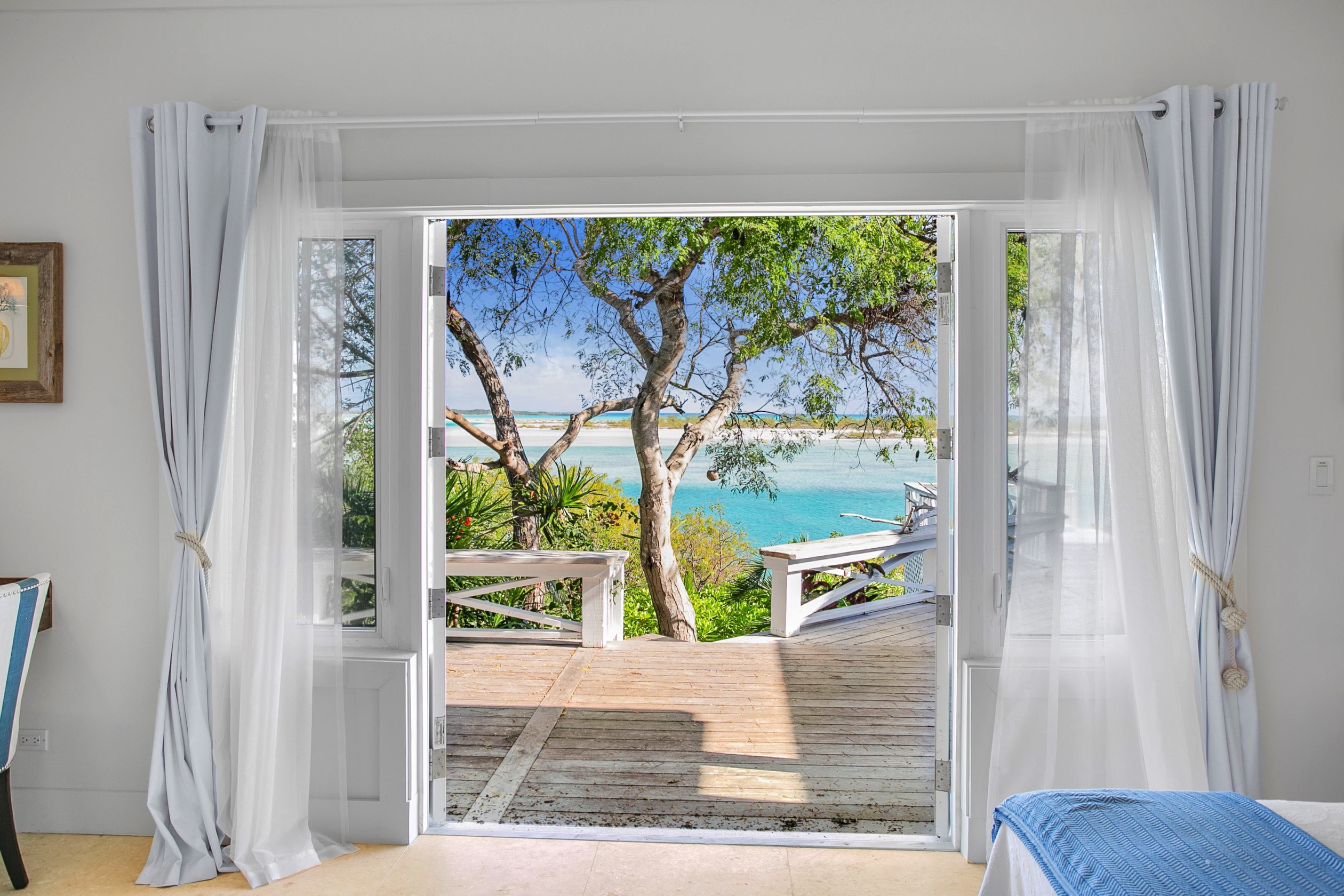 Terracedoor open view of beach Bahari house Great Exuma Bahamas